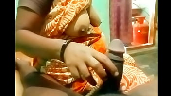 Auntie’s Expert Hands Molding A Young Man’s Hard Cock